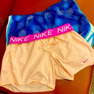 2 pair of Nike running shorts.